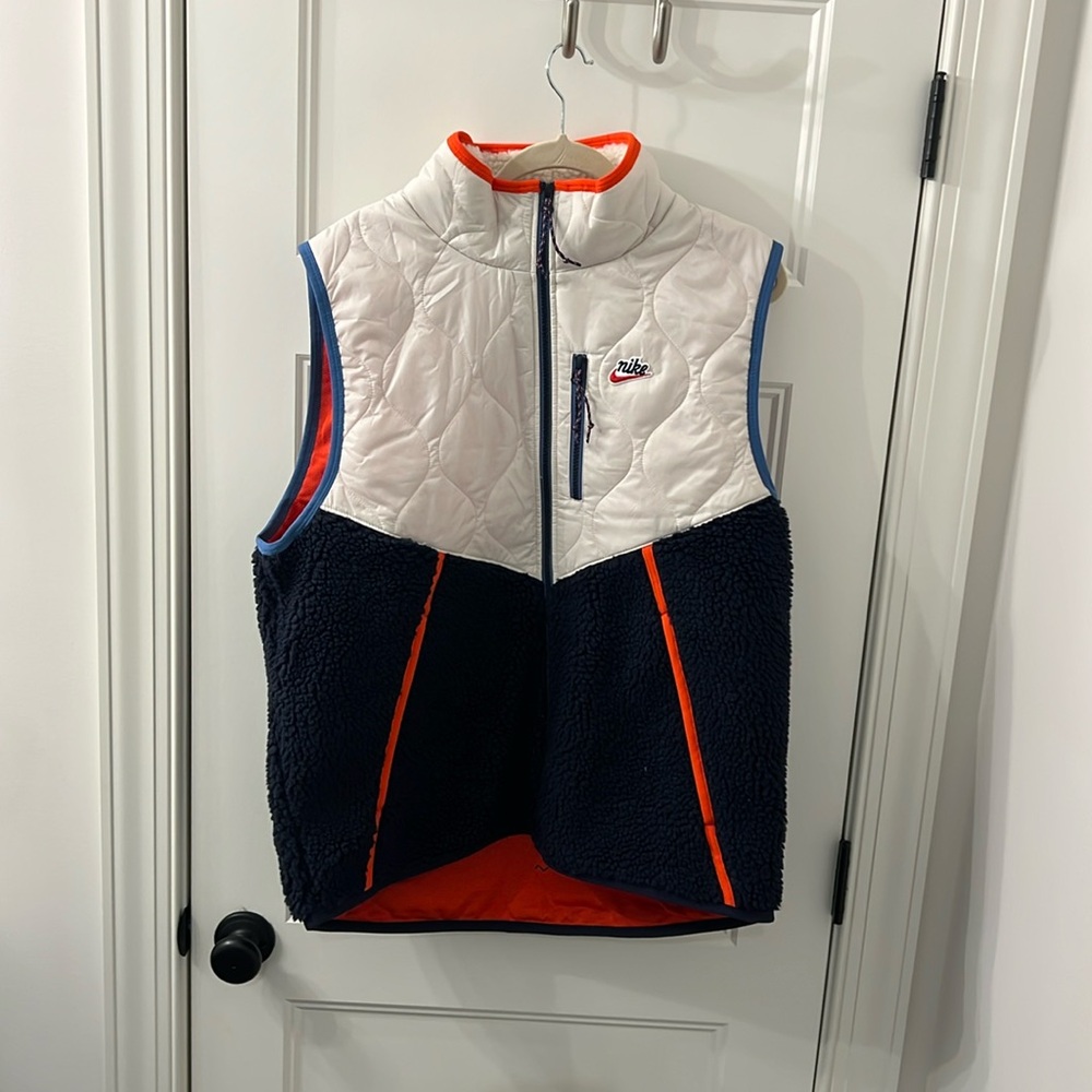 Brand new (no tags) never word.  Nike vest (large)
